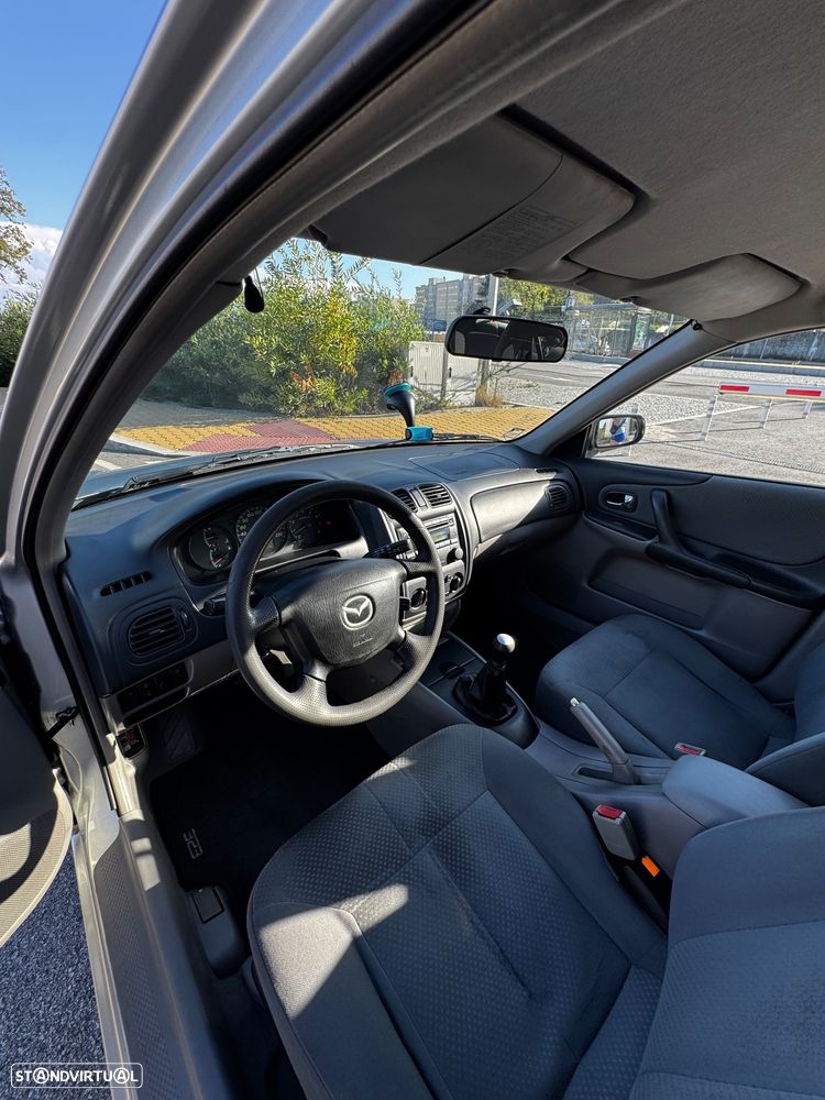 Mazda 323 F 1.3 Comfort AC+CR - 13
