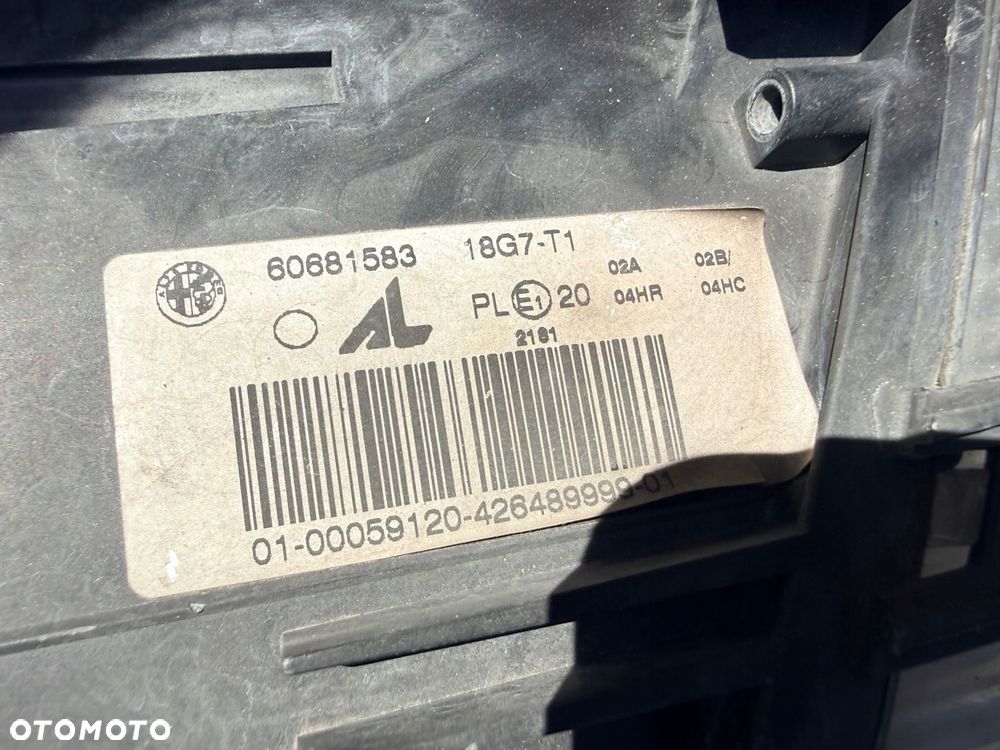 Lampa przednia ALFA ROMEO GT ZWYKŁE KOMPLET EUROPA ORYGINALNE AL - 8
