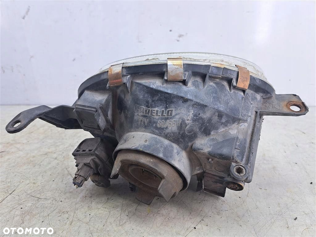 Reflektor lampa przód lewa Toyota Corolla 8 VIII E11 97-99 CARELLO EU - 2