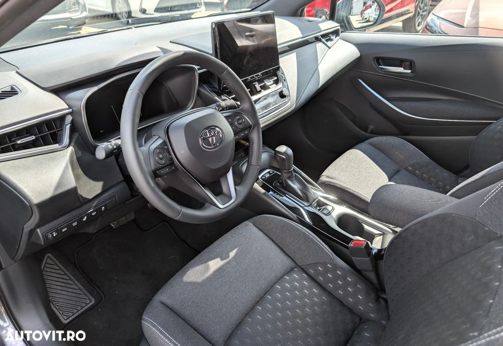 Toyota Corolla 1.8 HSD Business - 8
