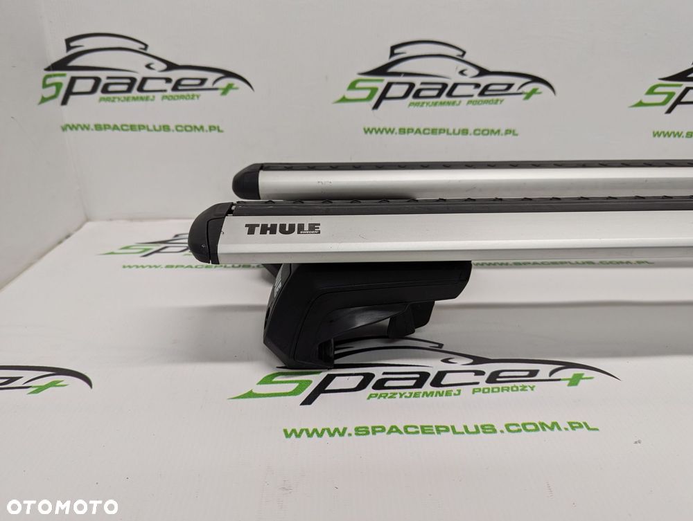 Bagażnik dachowy Thule: belki 711200 + Stopy 7104 Na otwarte relingi - 2