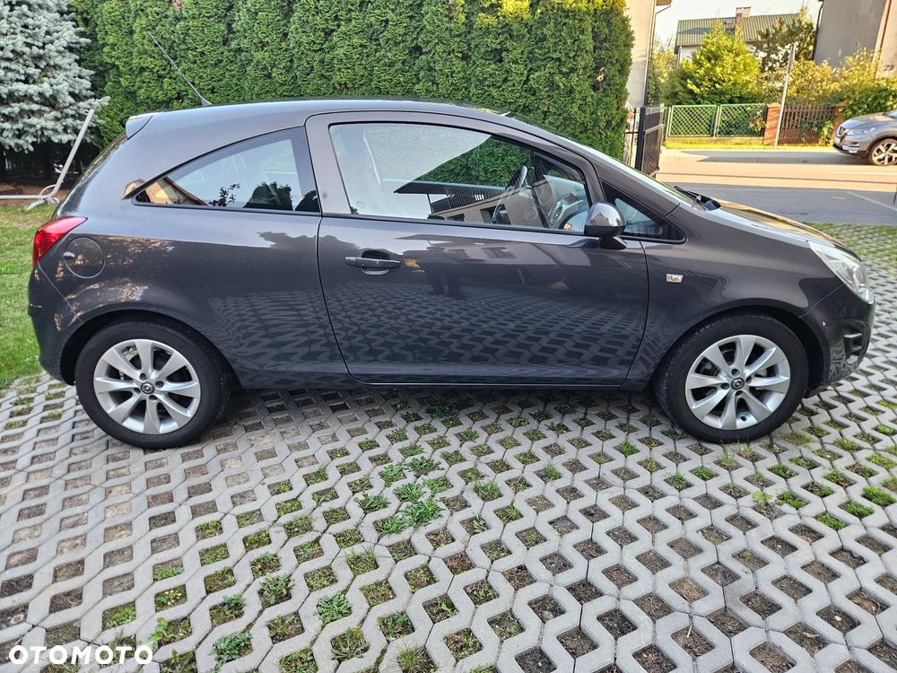 Opel Corsa 1.4 16V Active - 4