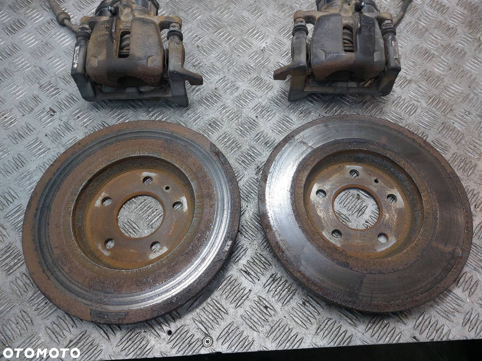TARCZE HAMULCOWE TYŁ + KLOCKI + ZACISKI AUDI Q5 8R 8K0615601B 32335478 - 3