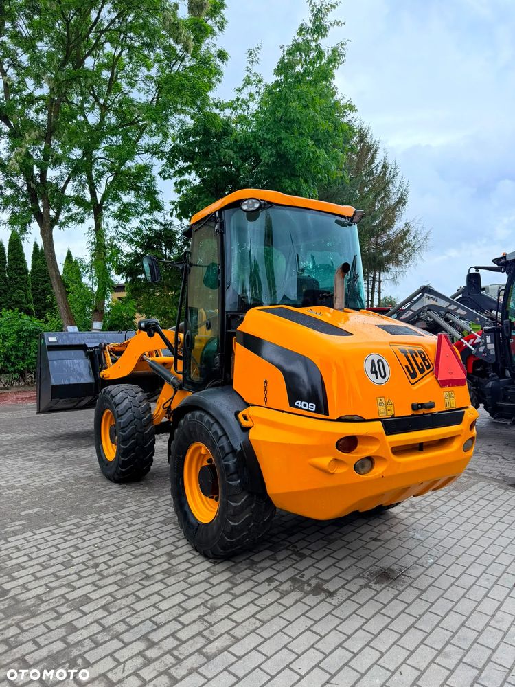 JCB 409 - 18