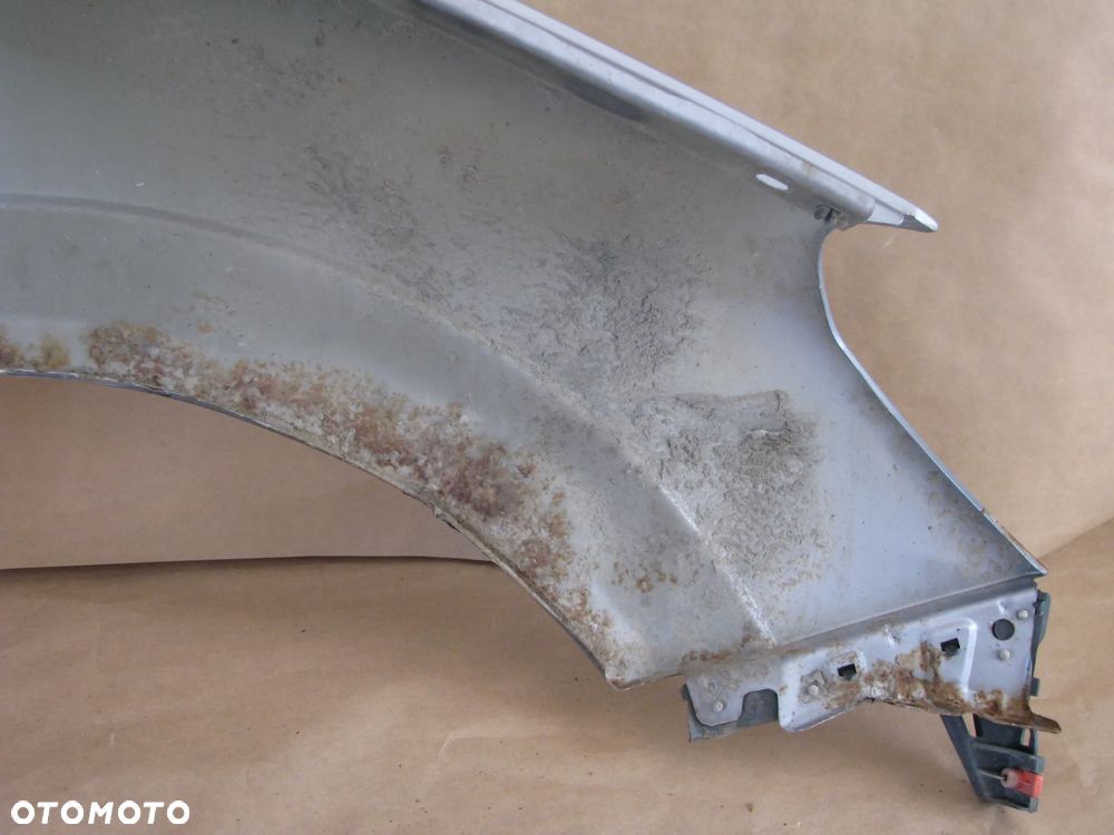 BŁOTNIK LEWY PRZÓD OPEL ASTRA H KOMBI - 7