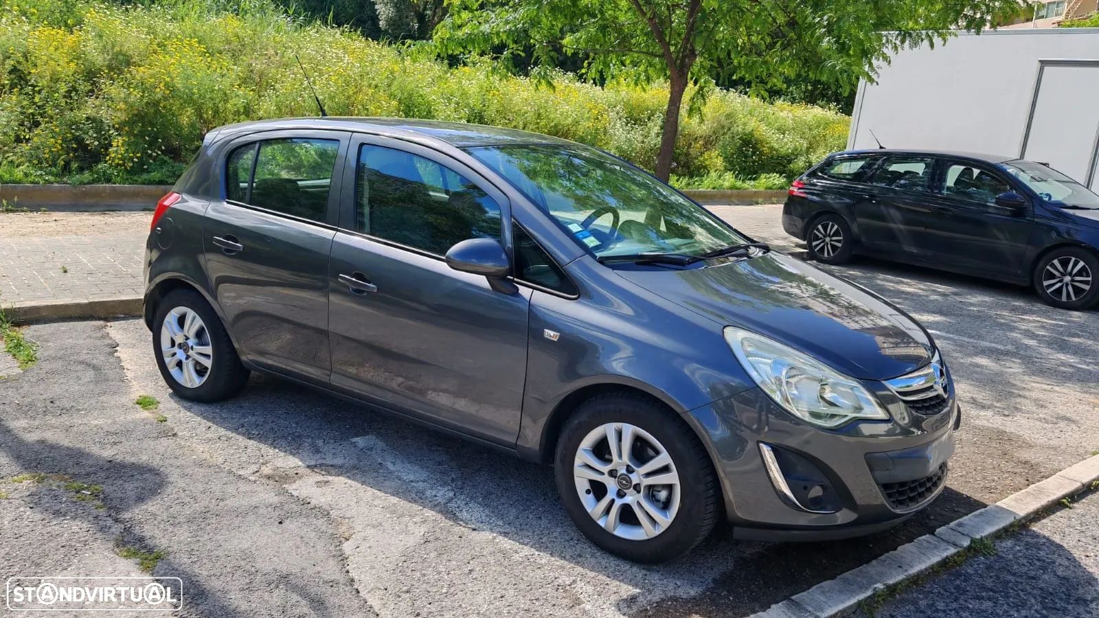 Opel Corsa 1.2 Enjoy - 1