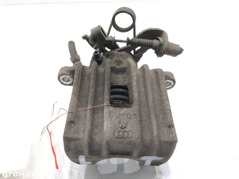 ZACISK LEWY TYŁ - 73.00 PLN - AUDI A4 B7 Avant (8ED) 2004 - 2008 2.0 TDI 103 kW [140 KM] olej - 1
