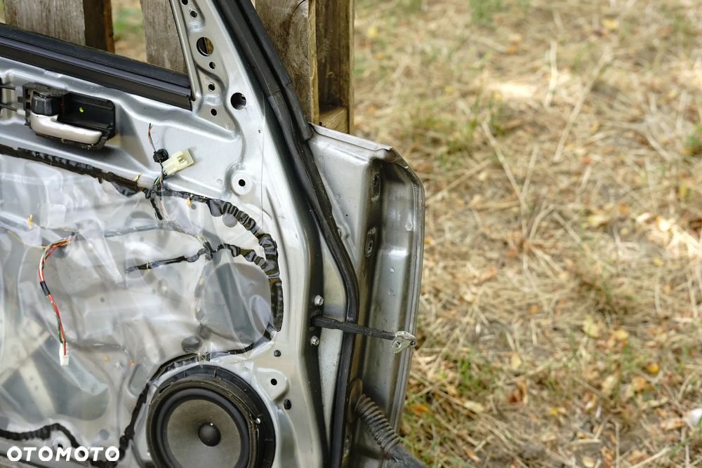 Drzwi przód przednie lewe Suzuki SX4 I ZCD - 14