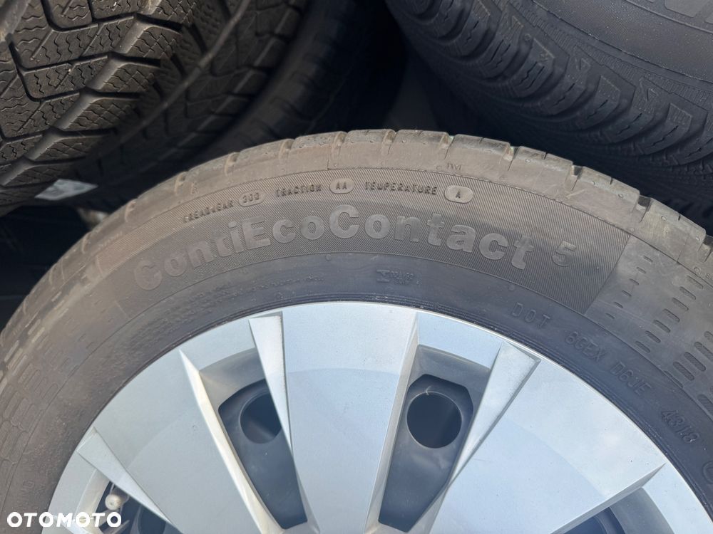 VW UP,Citigo.Felgi 14 ,4szt.175/65/14.Bieznik-7,5mmz kołpakami z oponami Continental,jak Nowe. VW Up,Skoda Citigo 4x100 - 5