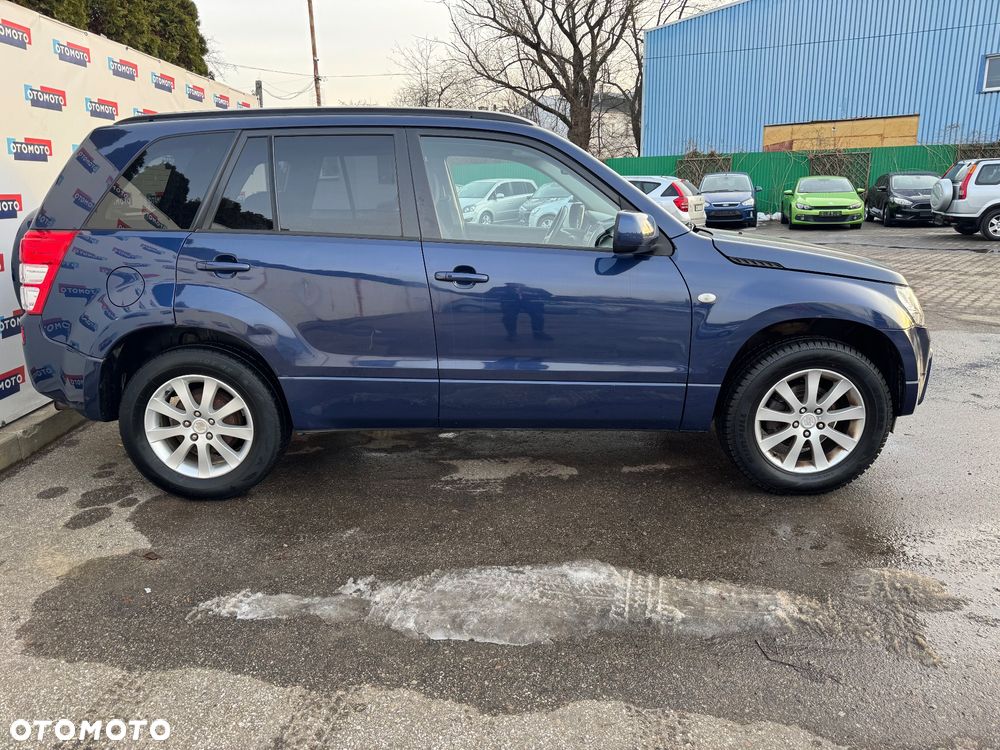 Suzuki Grand Vitara 2.0 Comfort + Family - 3