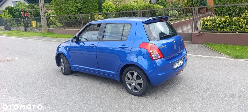 Suzuki Swift 1.3 Club - 4