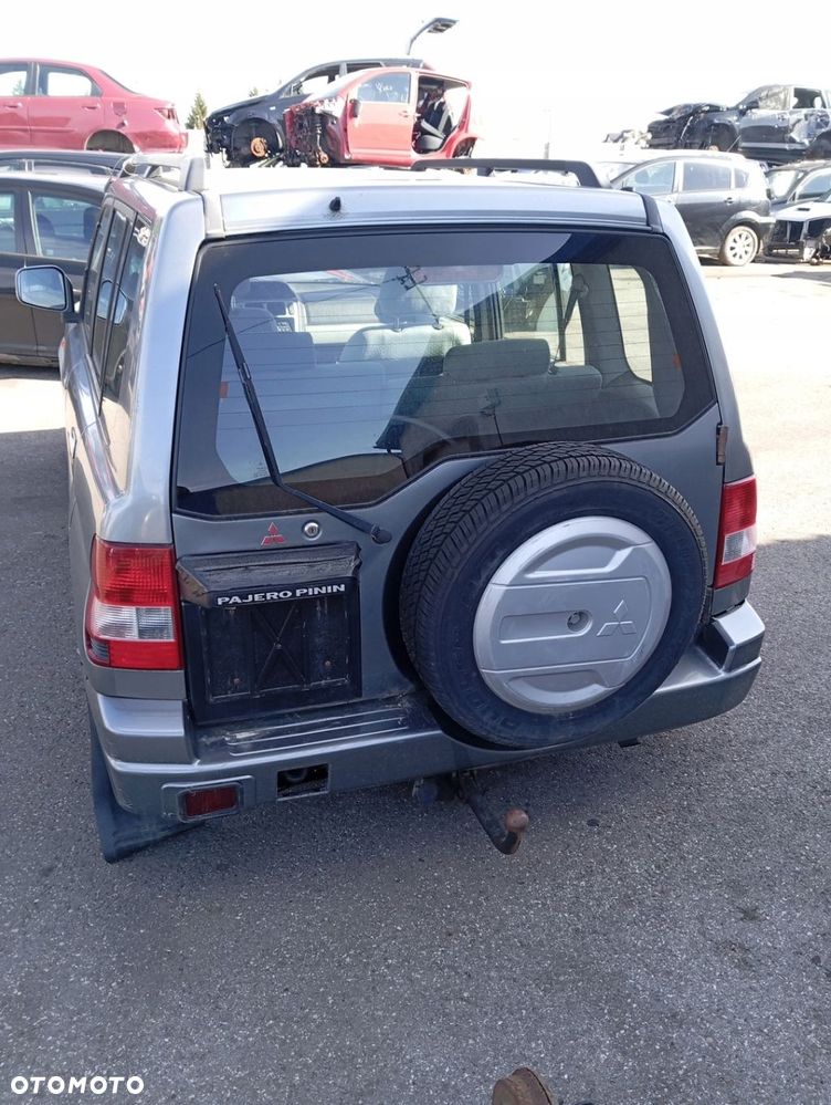MITSUBISHI PAJERO PININ 5D KLAPA BAGAŻNIKA GOŁA Z SZYBĄ - 1