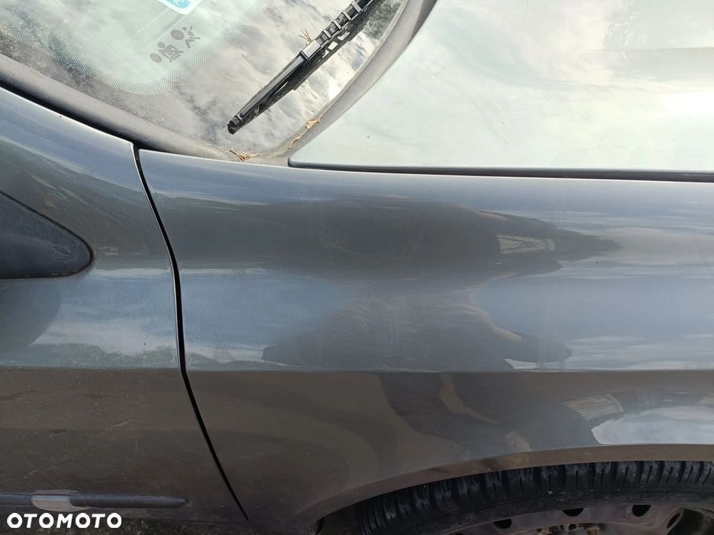 RENAULT LAGUNA II 01-07 LIFT 2006 r. HB NV603 błotnik prawy przód PP * - 6