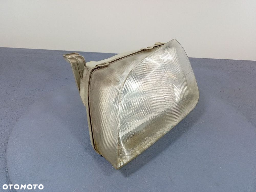 SUZUKI SWIFT III 96-04 REFLEKTOR LEWY EU 35300-80E - 3