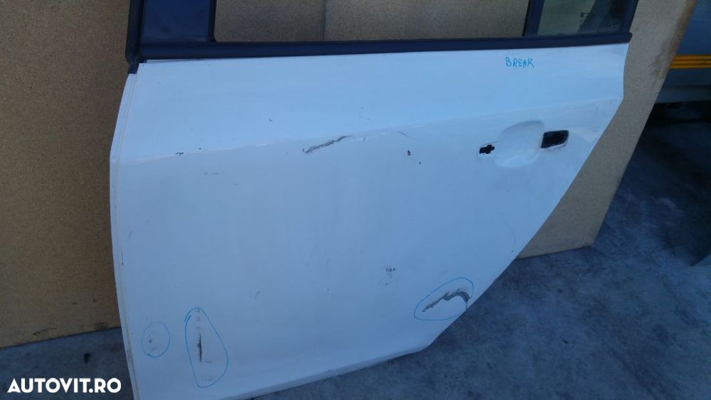 usa portiera stanga spate chevrolet cruze  break 2010 - 1