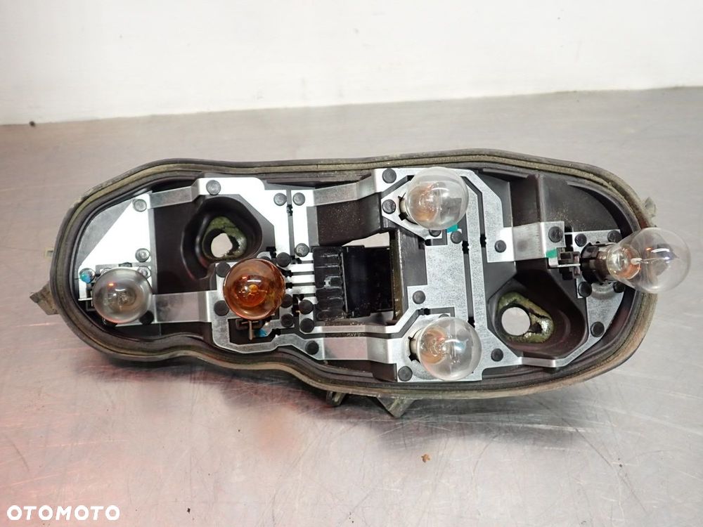 LAMPA LEWA TYLNA OPEL CORSA D - 10