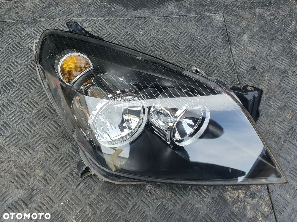 OPEL ASTRA H 3 LAMPA PRAWA REFLEKTOR PRAWY PRZÓD TYC 20-A389L