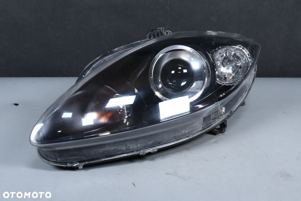 Lampa lewy przód Bi-Xenon Skrętny Seat Leon II Altea (04-09) Przedlift EU - 1