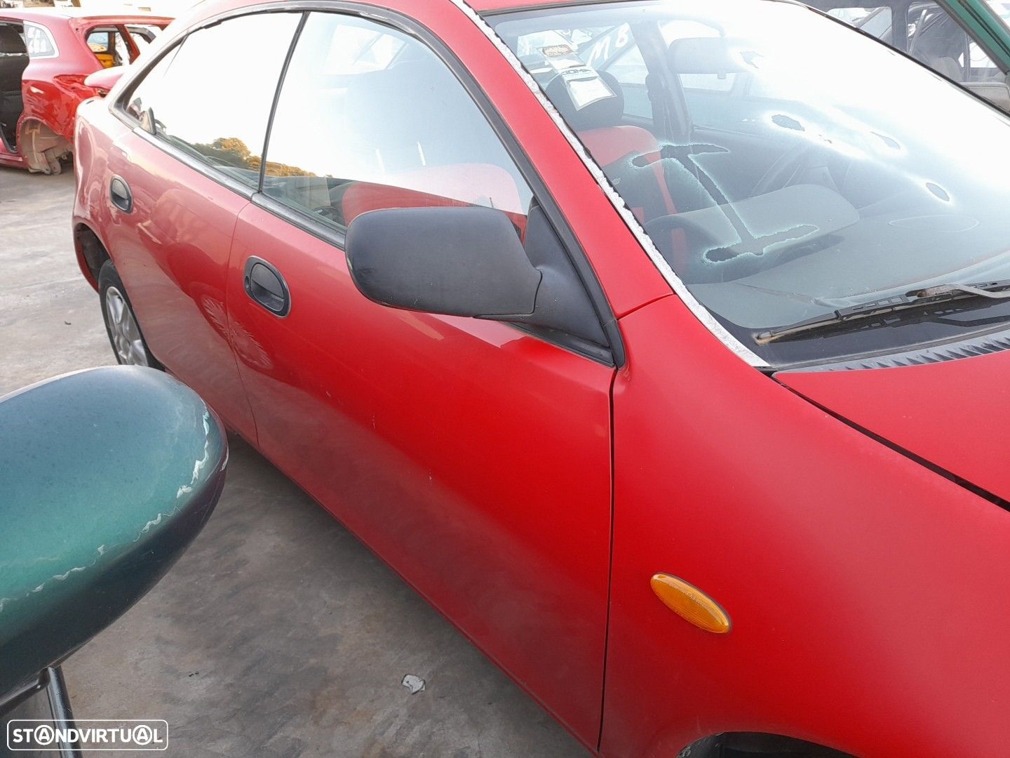 Porta frente direita MAZDA 323 F V (BA) - 1