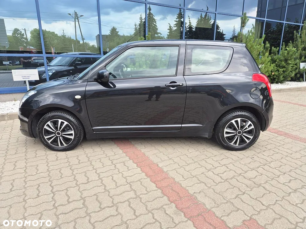 Suzuki Swift 1.3 Club - 3