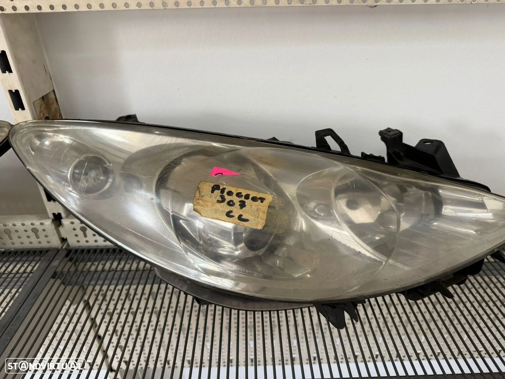 Farol peugeot 307 cc esquerdo - 1