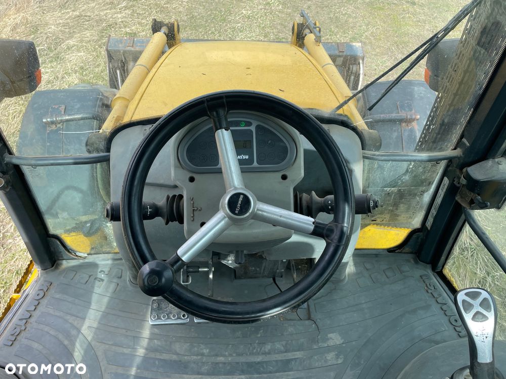 Komatsu WB97S-5E0 - 13