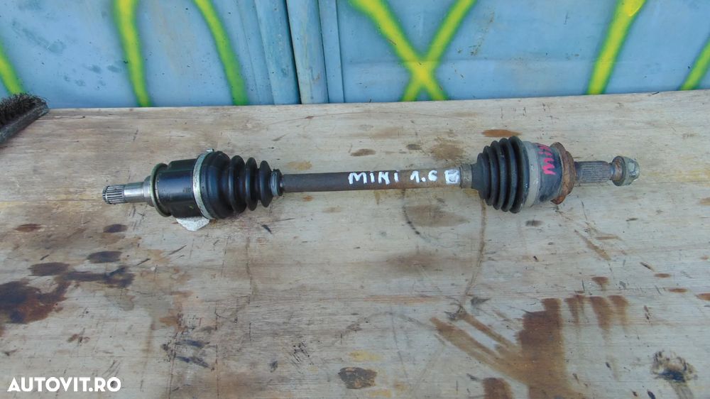 Planetara stanga fata Mini Cooper 1.6 benzina an 2004 - 2