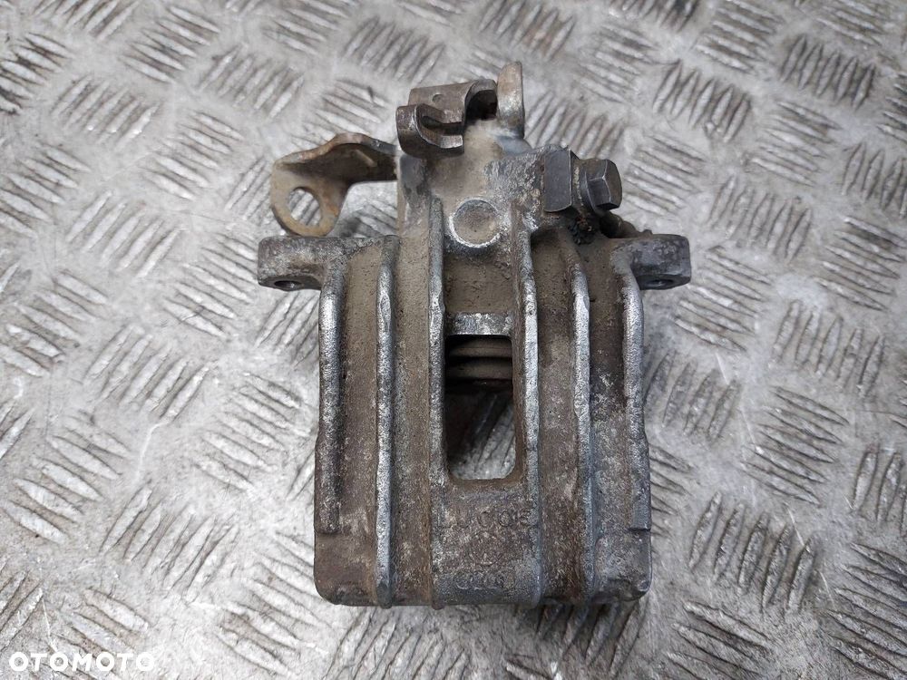 ZACISK HAMULCOWY PRAWY TYŁ GOLF IV BORA I LEON I TOLEDO II OCTAVIA I - 1