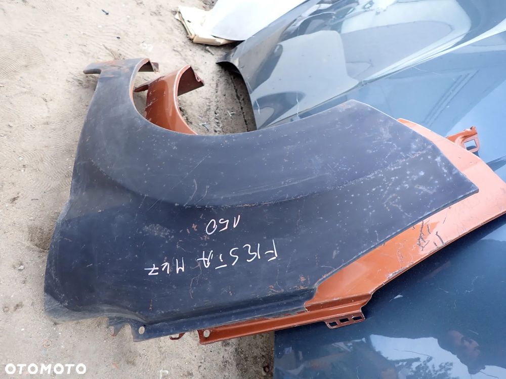 FORD FIESTA MK7 BŁOTNIK LEWY PRZÓD NOWY - 2