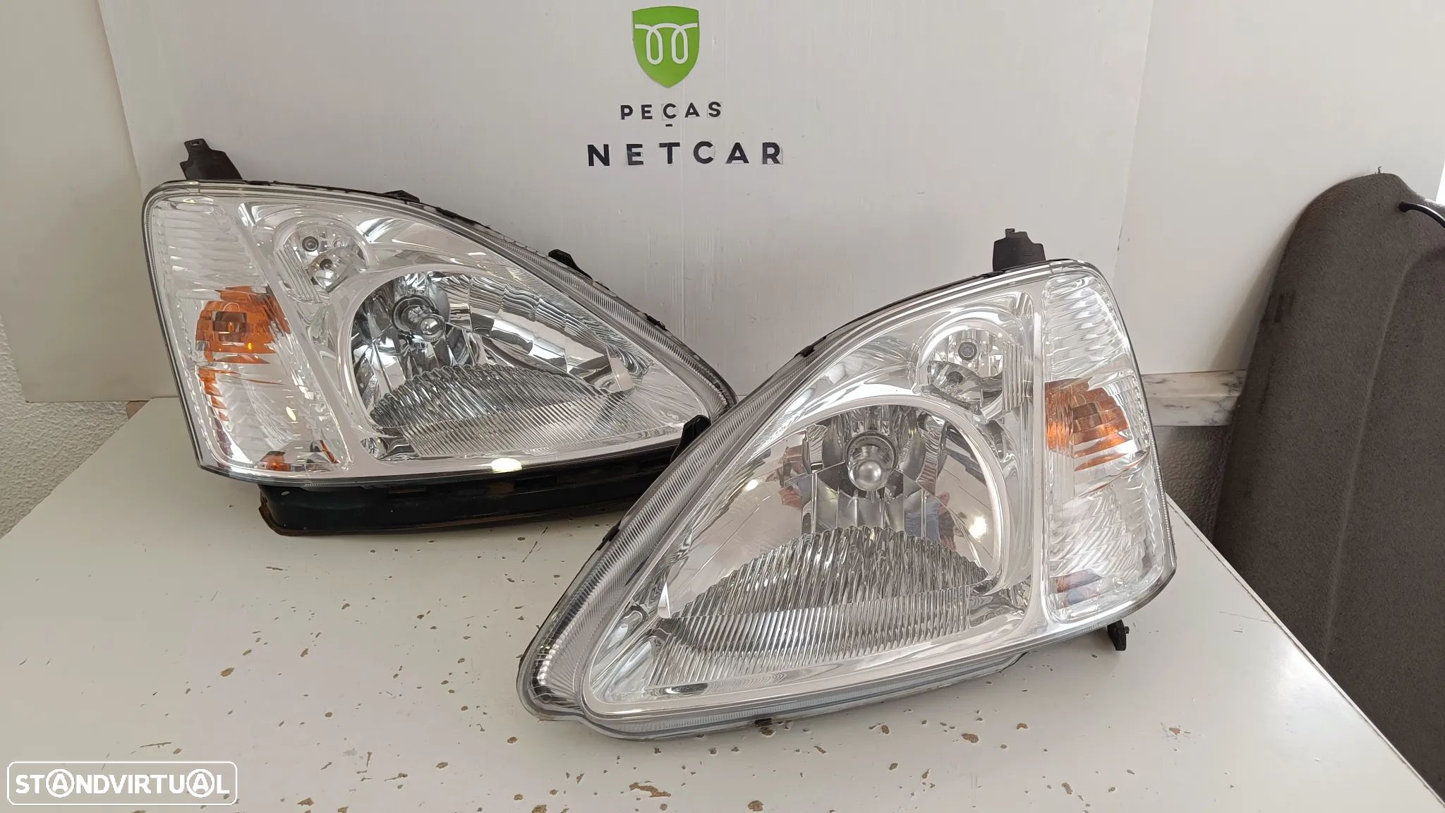Farol óptica esquerdo Honda Civic 2003 H/B - 1