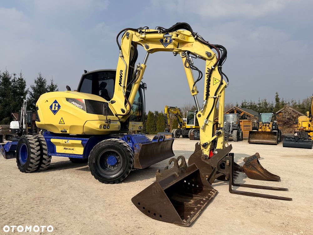 Mecalac Koparka 14 ton MECALAC 15 MWR koparko-ładowarka 3 łyżki widły 1 wł Centr.smarowanie Opony na BLIŹNIAKU 80%Camso ładowarka 714 12MTX 4x4 skrętne KLIMA kabina Premium silnik 146KM volvo EW140B DEUTZ szybka 35km/h - 6