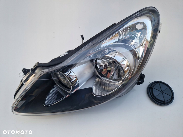 OPEL CORSA D 06-11 LAMPA LEWA REFLEKTOR CIEMNA CIEMNY SRODEK NOWA TYC