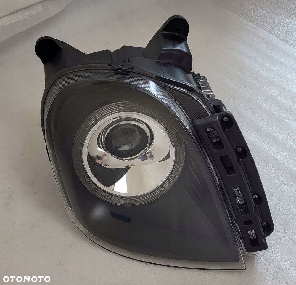 LAMPA PRAWA PRZÓD PRZEDNIA LEVC TX VN5 - 4