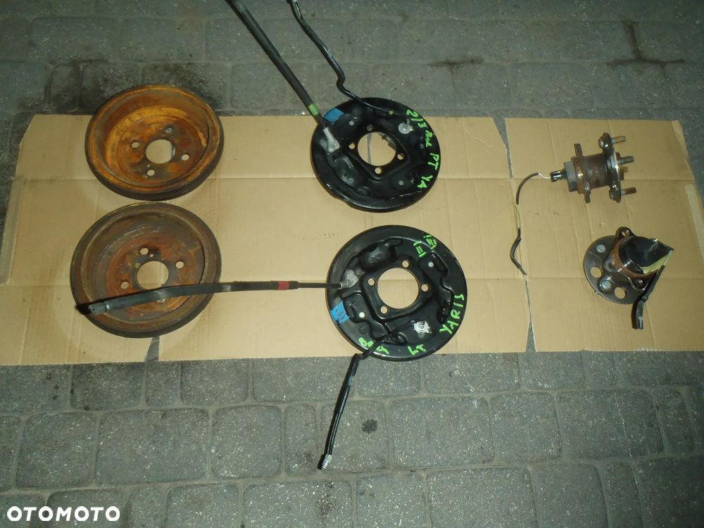 bęben szczęki cylinderek rozpierak hamulec tylny osłona tarcza kotwiczna kostka abs z zawieszenie tył toyota yaris II III 2 3 jak nowe - 9