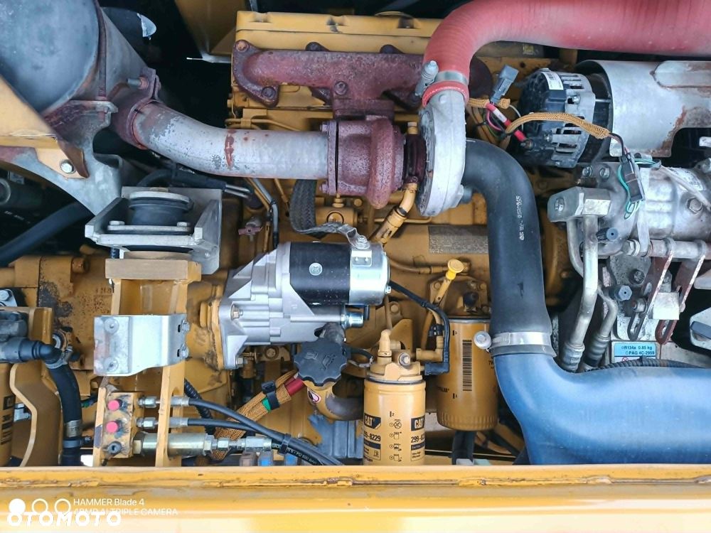 Caterpillar M313D - 4