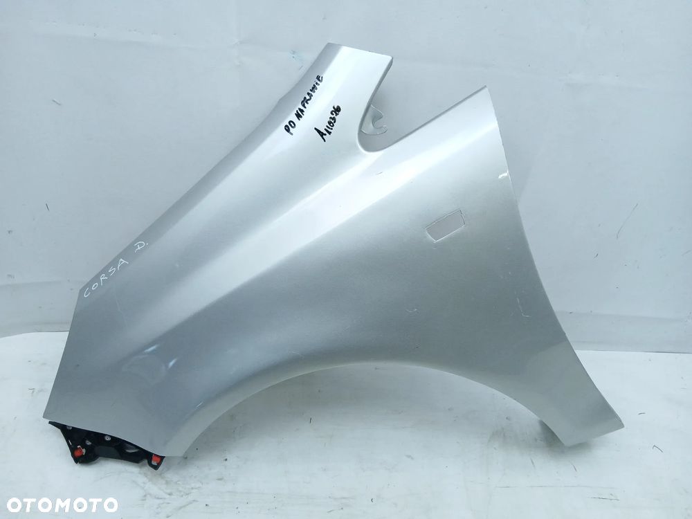 Błotnik przód przedni lewy Opel Corsa D - 1