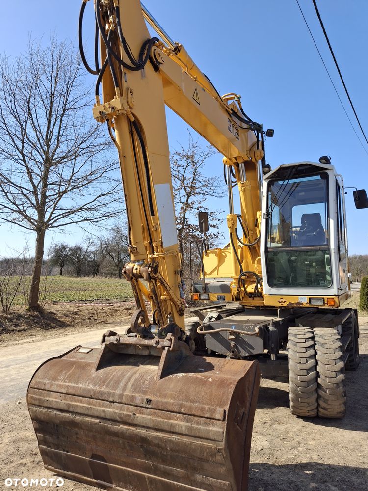 Liebherr A312 CAT JCB - 20