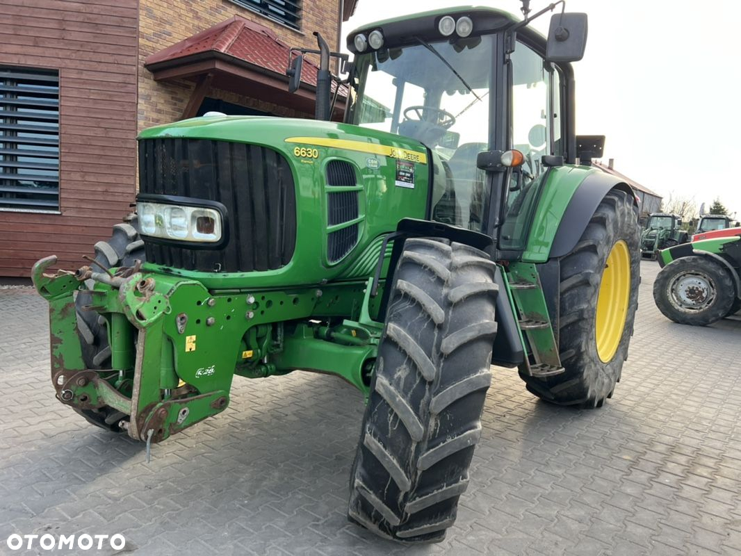 John Deere 6630 Premium 6830. new holland - 6