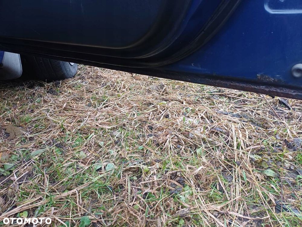 DRZWI KOMPLETNE PRAWY PRZÓD TOYOTA COROLLA E12 8Q4 - 8