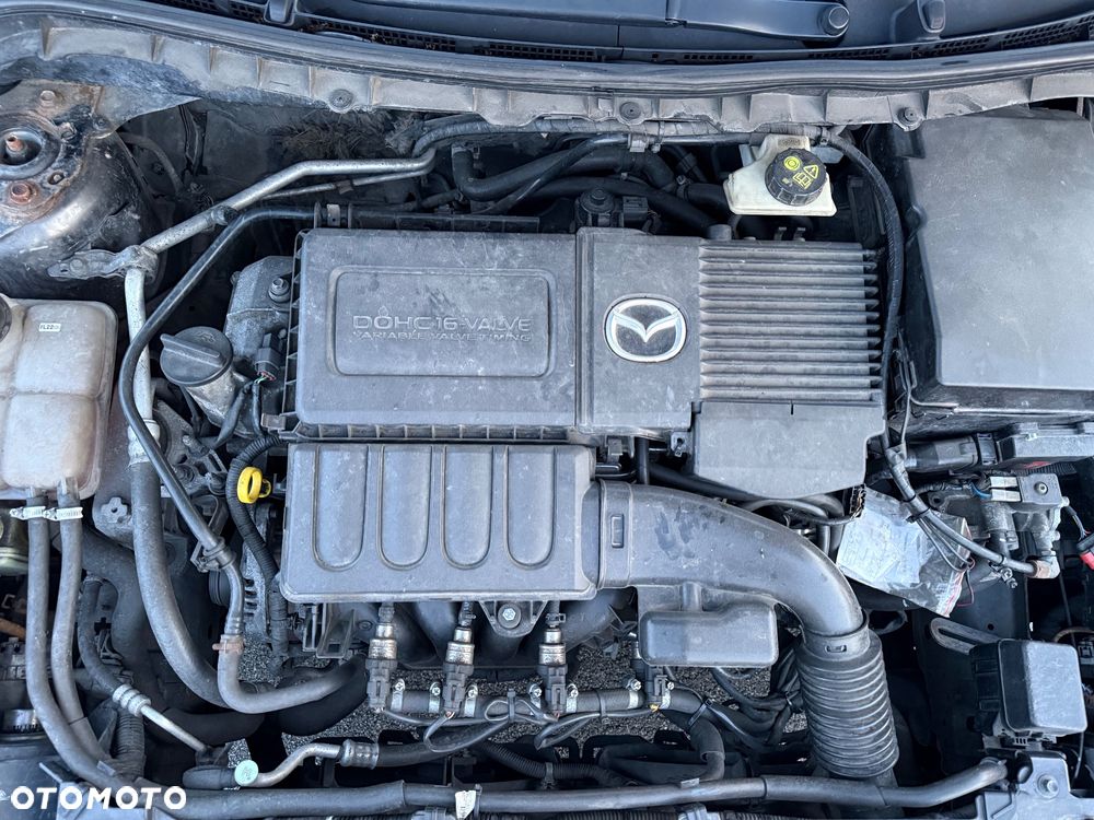 Mazda 3 1.6 Exclusive + - 12