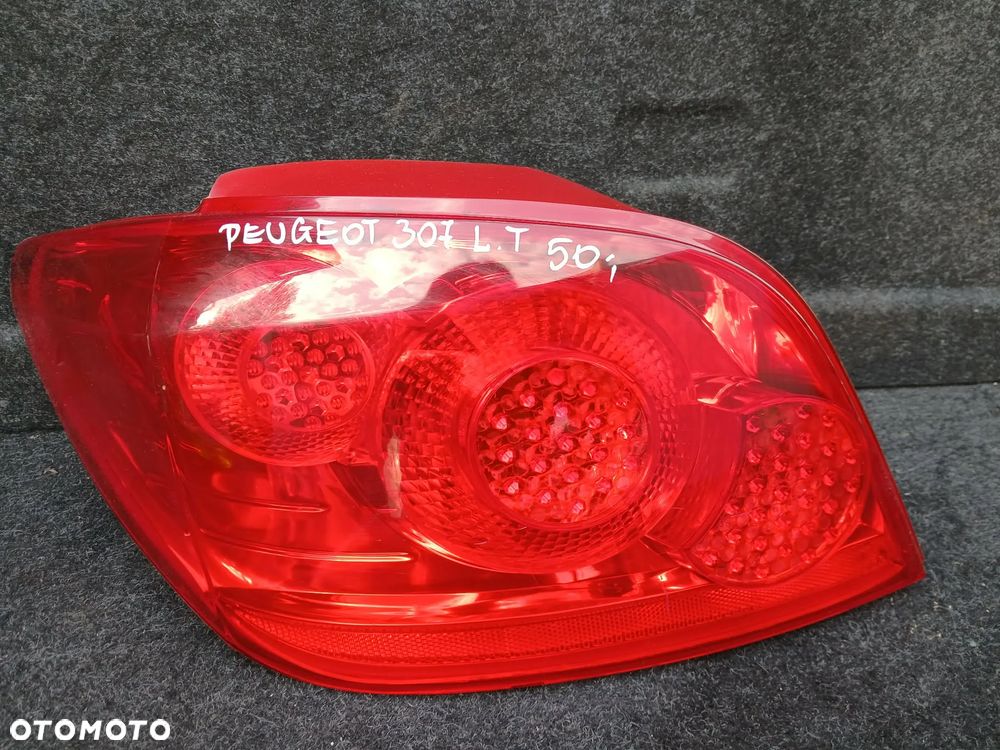 Peugeot 307 HB Lift lampa tylna  lewa. - 2
