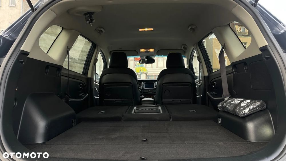 Kia Carens - 12