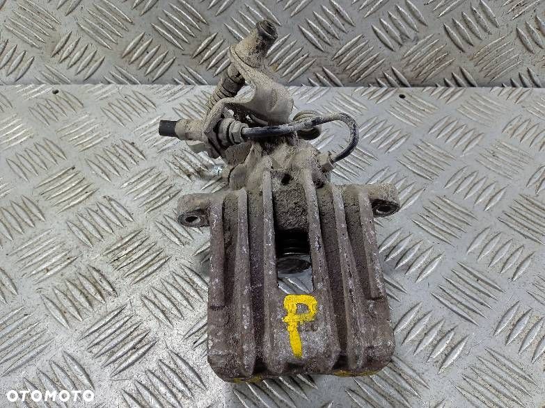 ZACISK PRAWY TYLNY VOLKSWAGEN GOLF 5 - 1