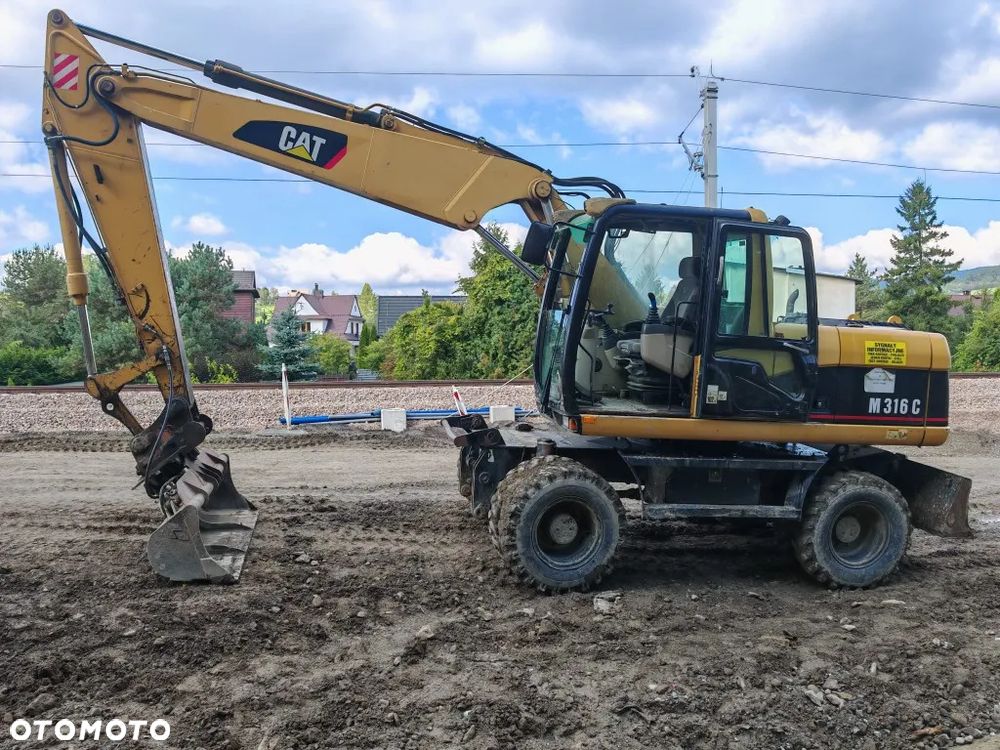 Caterpillar M316C - 4