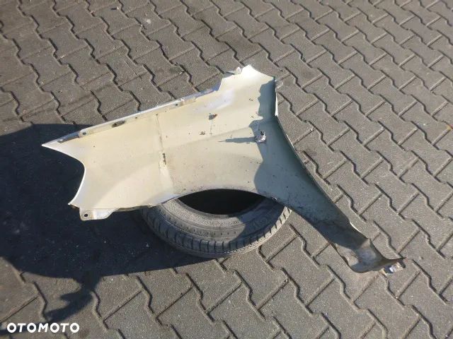 BŁOTNIK PRAWY PRZÓD PRAWY PRZEDNI CHEVROLET AVEO II T250 07-11 - 20