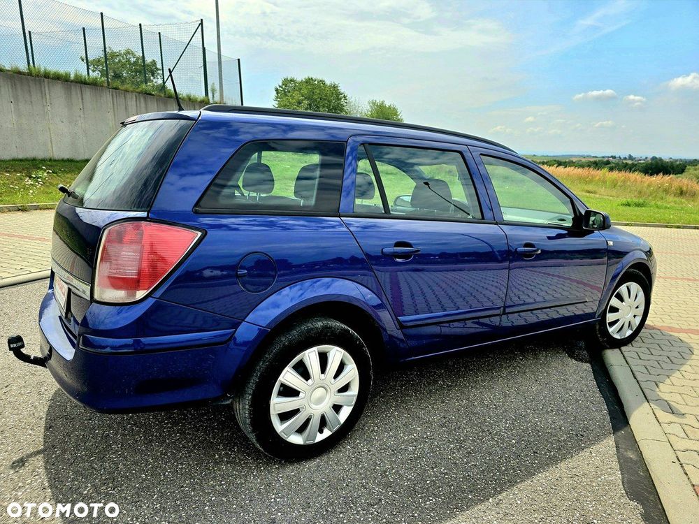 Opel Astra 1.8 Caravan Edition - 9