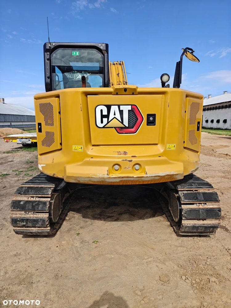 Caterpillar 310 - 4