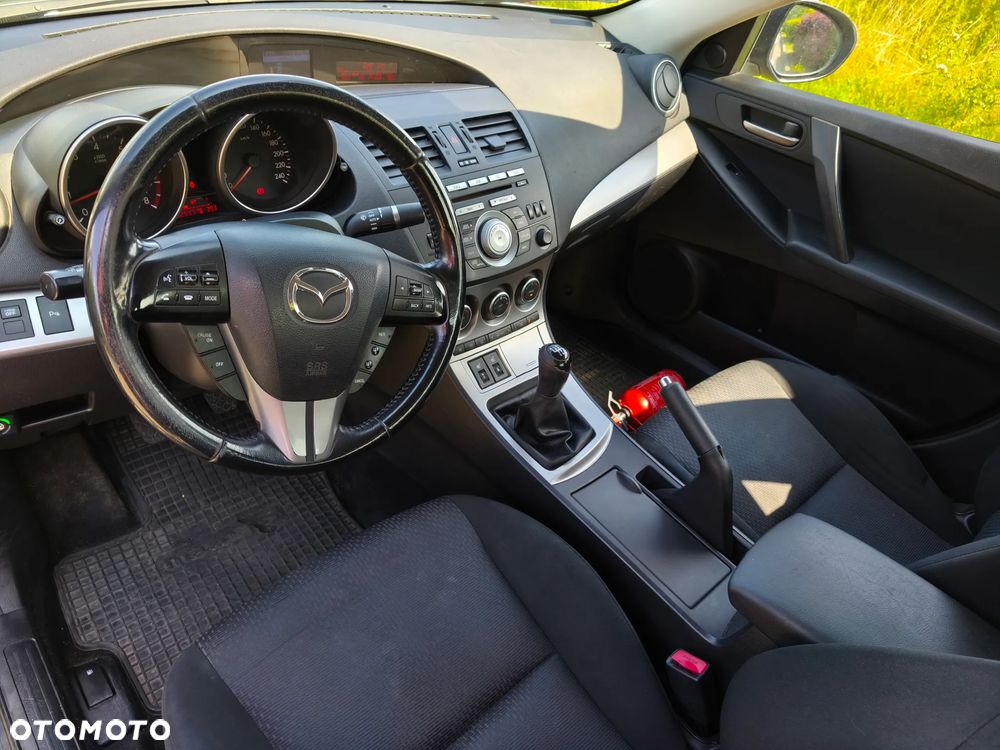 Mazda 3 2.0 Exclusive + - 12