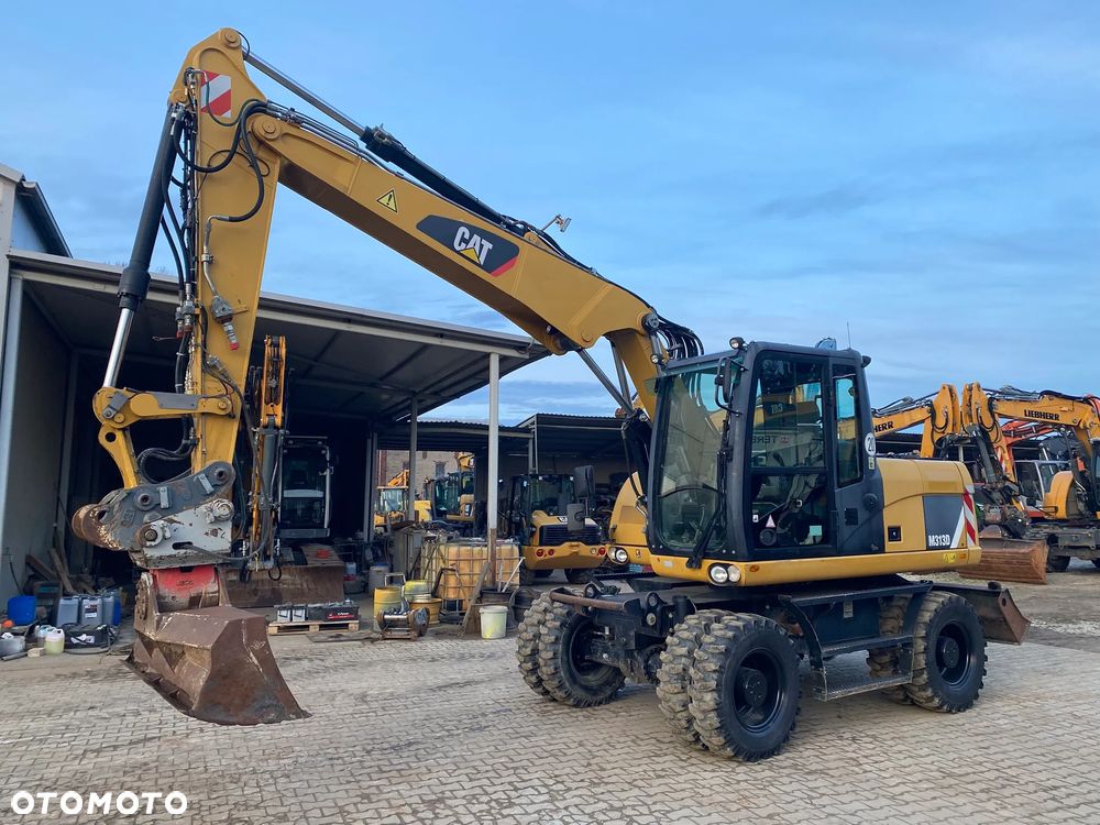 Caterpillar CAT M313D, 7500 MTH, 2015 ROK, Z NIEMIEC, - 1