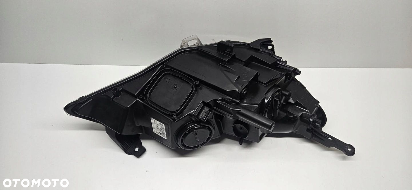 OPEL ASTRA IV 4 J GTC REFLEKTOR LEWY SOCZEWKA ZWYKŁA LAMPA - 10